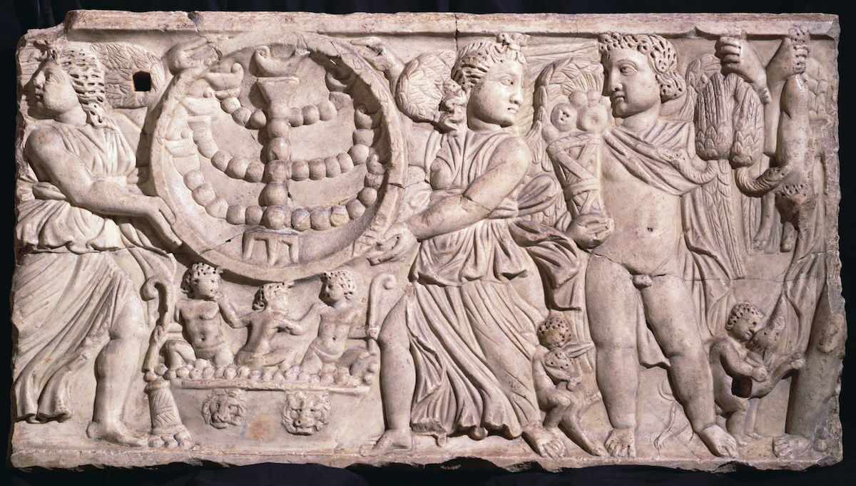 A sarcophagus with a menorah from the Roman catacombs, AD 251-350. Bridgeman.