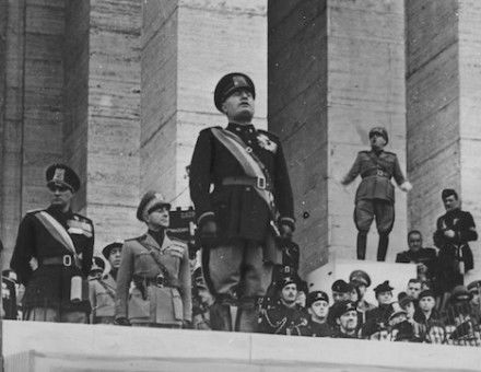 Benito Mussolini at a ceremony for the Italian Academy of Physical Education in Rome, 1940. Narodowe Archiwum Cyfrowe. Public Domain.