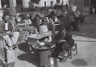 A falafel vender in the Old City of Jerusalem, Palestine, c. 1935. Zoltan Kluger. National Photo Collection of Israel. Public Domain.