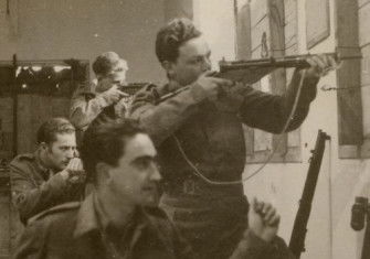 A Haganah unit defends its base in Safad, 1948. United States Holocaust Memorial Museum, courtesy of Sam Schalkowsky.