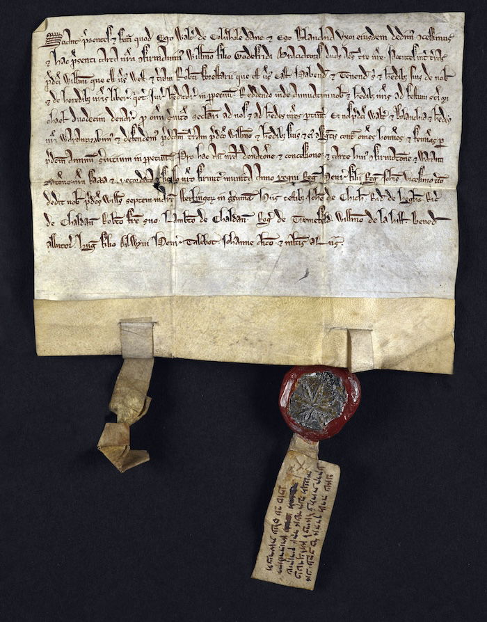 Latin deed with Hebrew quitclaim attached to seal. Jacob ben Aaron releases a piece of land to William le Briel, Canterbury, 1239. British Library/Bridgeman Images.