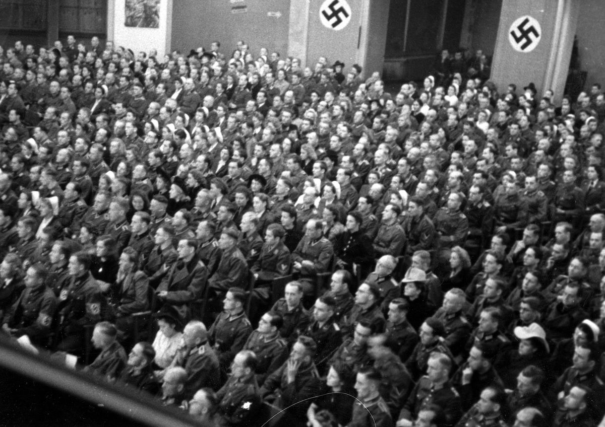 An audience at the Kino Roma in Warsaw during the German occupation, c. 1939-45. Narodowe Archiwum Cyfrowe. Public Domain.