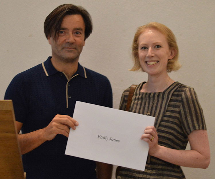 Emily Jones receives her prize from editor Paul Lay. Emily Jones receives her prize from editor Paul Lay.