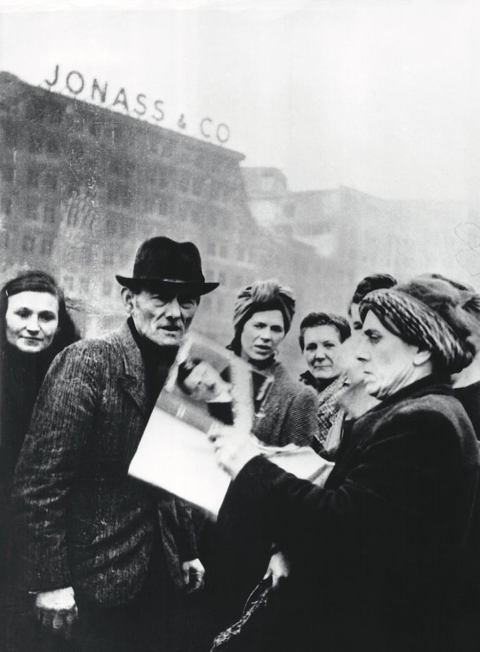 A woman destroys a copy of Mein Kampf, Berlin, c.1945. Keyston-France/Gamma-Rapho/Getty Images.