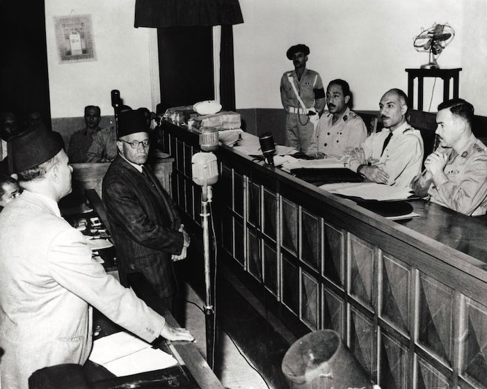 Hasan al-Hudaybi, leader of the Muslim Brotherhood, gives evidence in the trial of Mahmoud Abdel-Latif, who attempted to assassinate Nasser, November 1954.