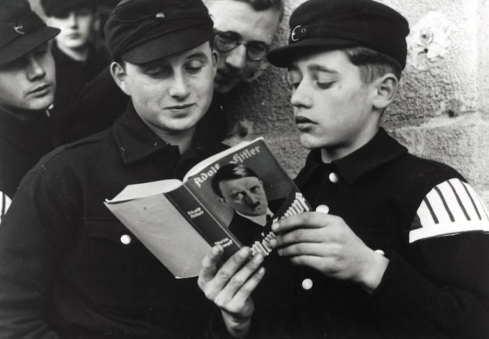 Young members of the Memelländischen Ordnungsdienst  read Mein Kampf,  22 March 1939.